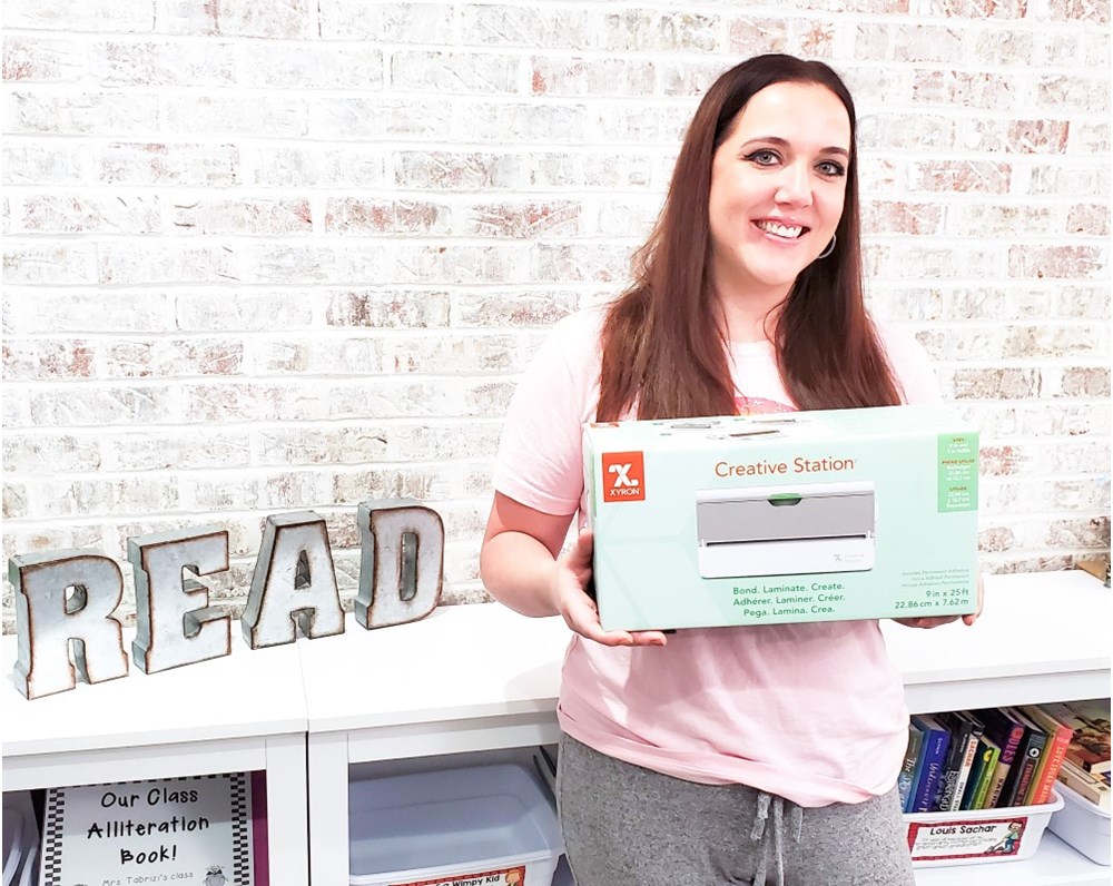 Cassie Tabrizi holding her Creative Station box